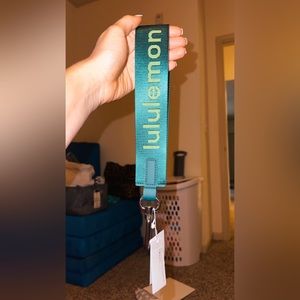 Lululemon green never lost keychain